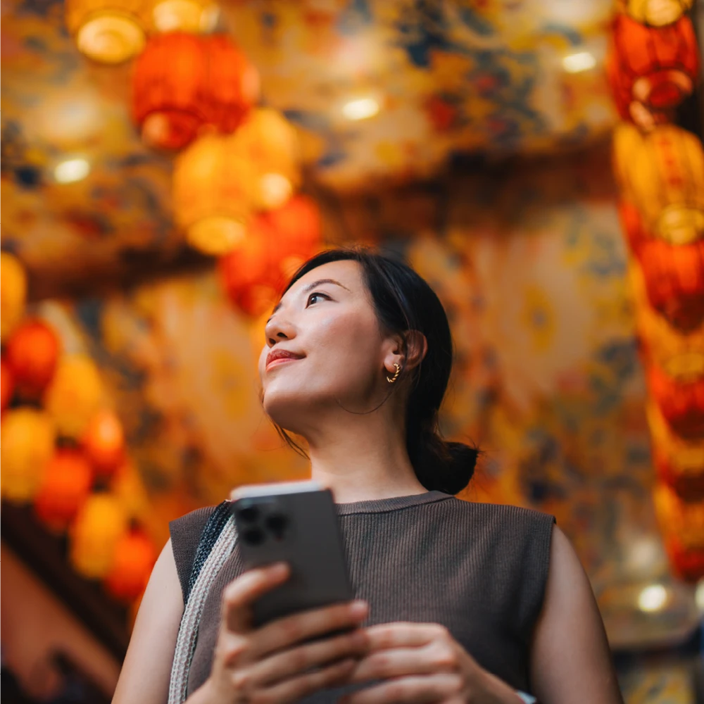 woman using phone indoors woman using phone indoors